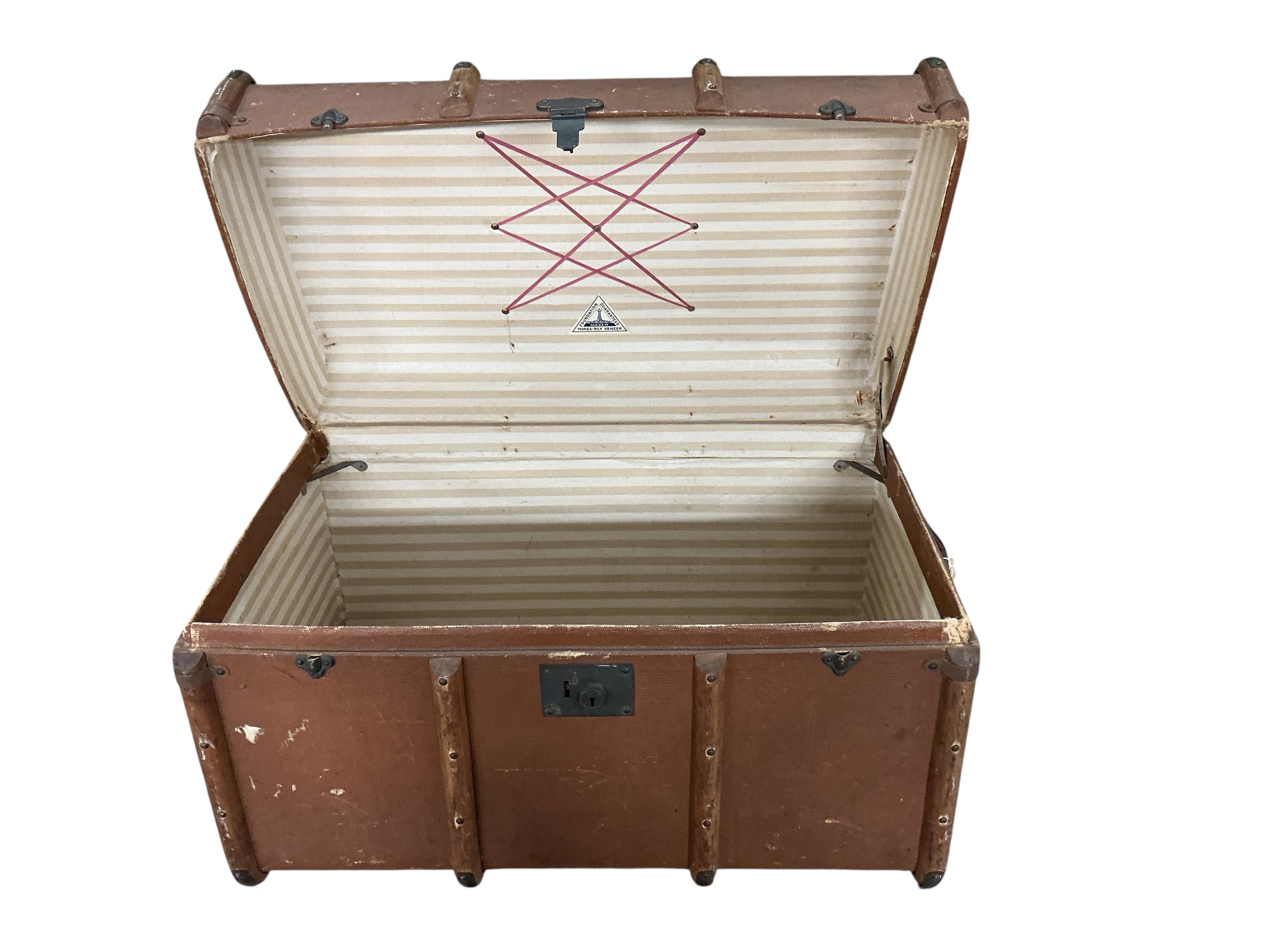 A Victorian painted tin trunk, width 60cm, depth 40cm, height 36cm together with a later larger canvas covered trunk